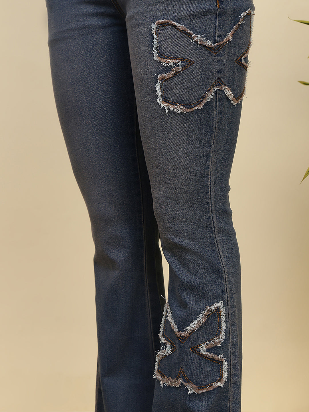 Women’s Blue High-Rise Flare Jeans with Frayed Patch Design